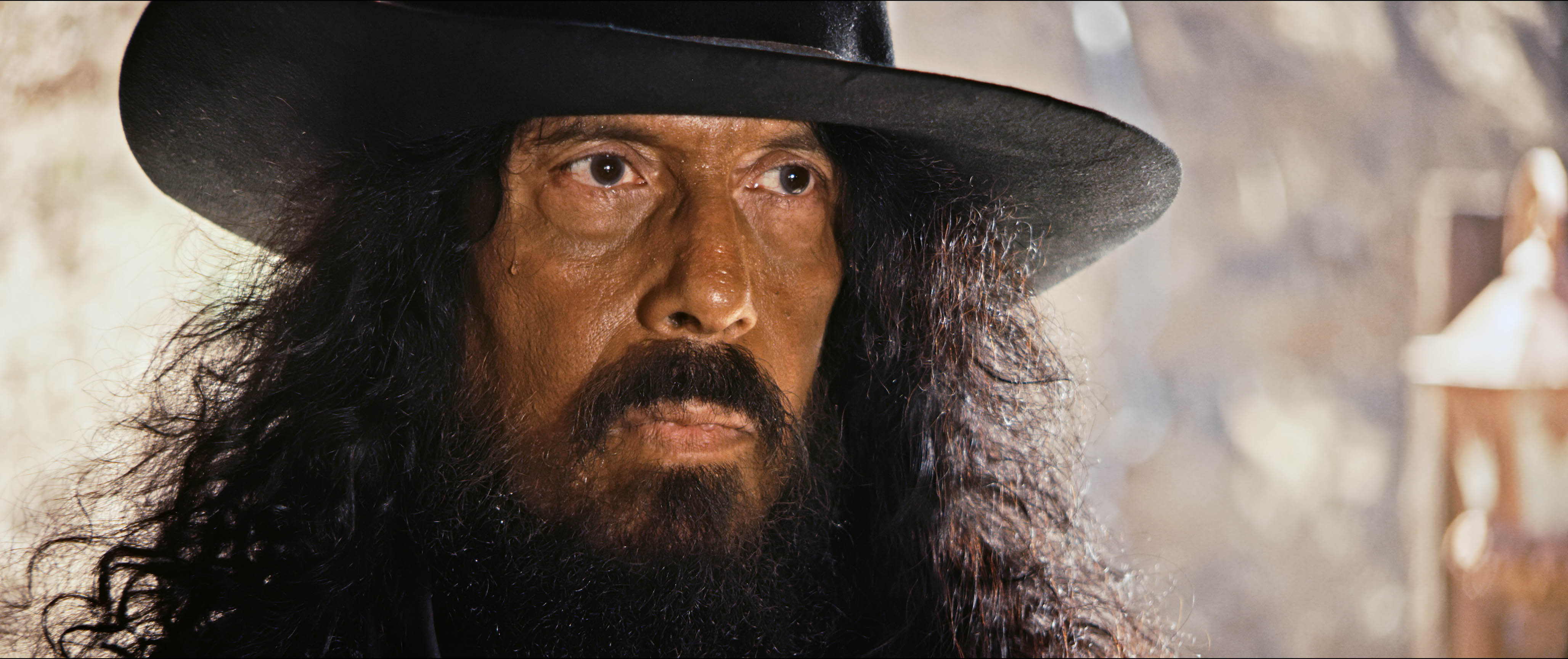 A man with a cowboy hat